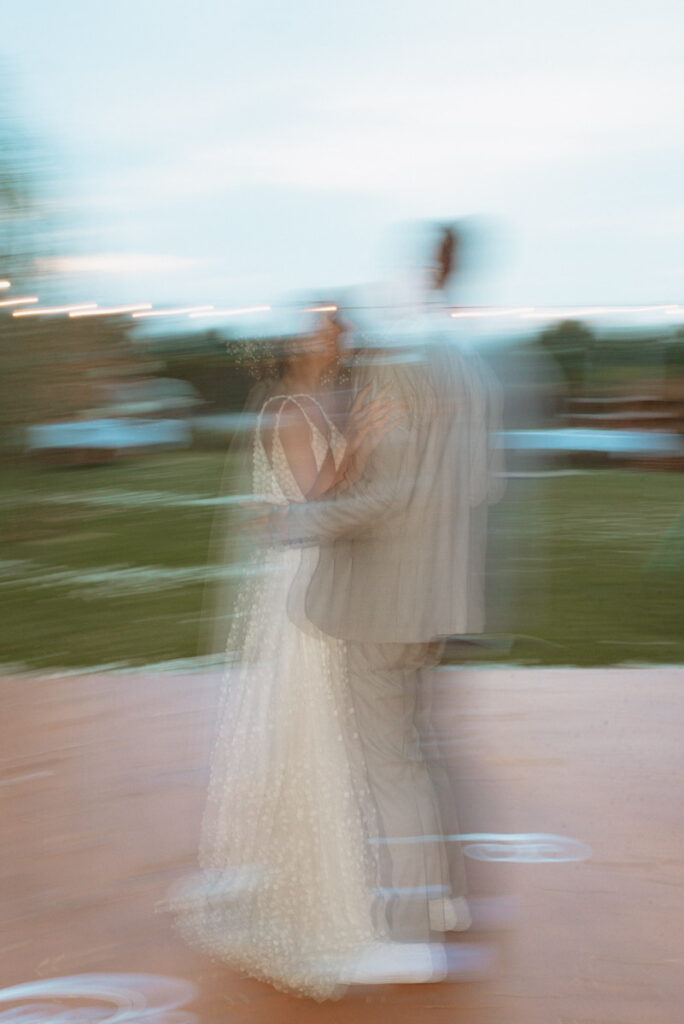 Sudbury backyard wedding couple's first dance. blurry photo. 