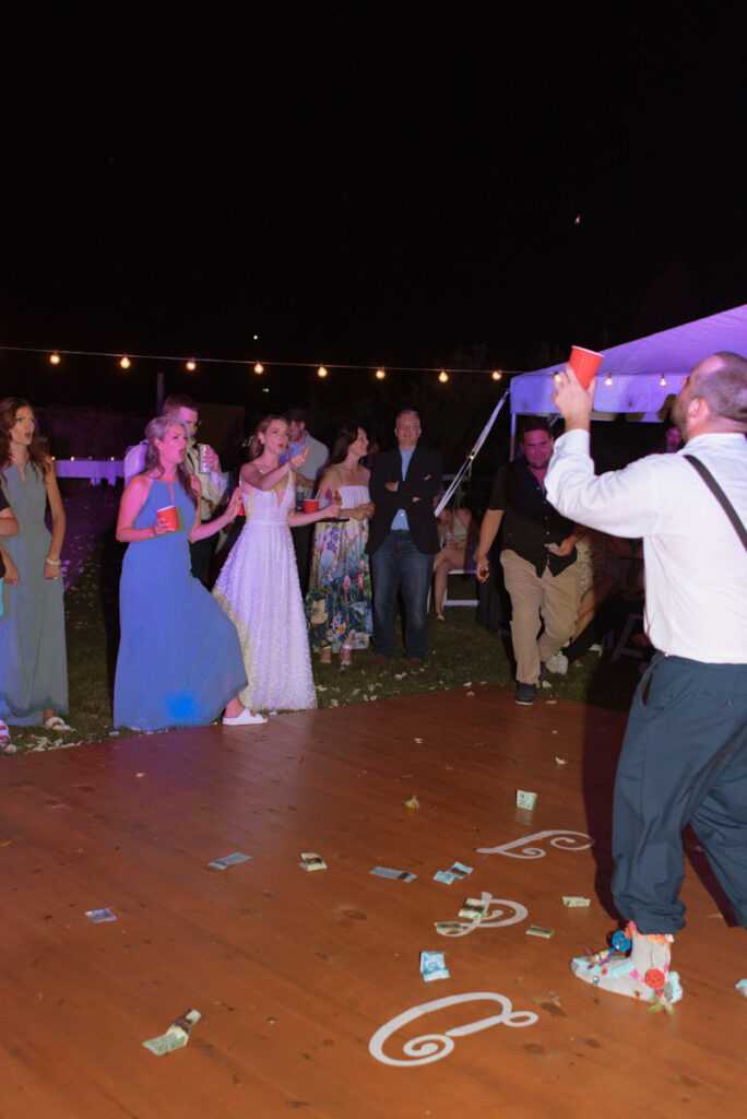 Sudbury backyard wedding reception sock dance. 