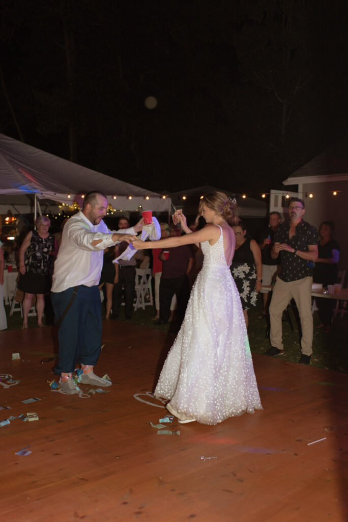Sudbury backyard wedding reception sock dance. 