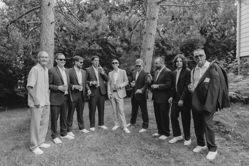Sudbury Backyard Wedding groom with all the guys standing in a backyard. 