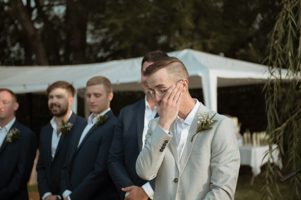 Sudbury backyard wedding groom crying when seeing bride for the first time. 