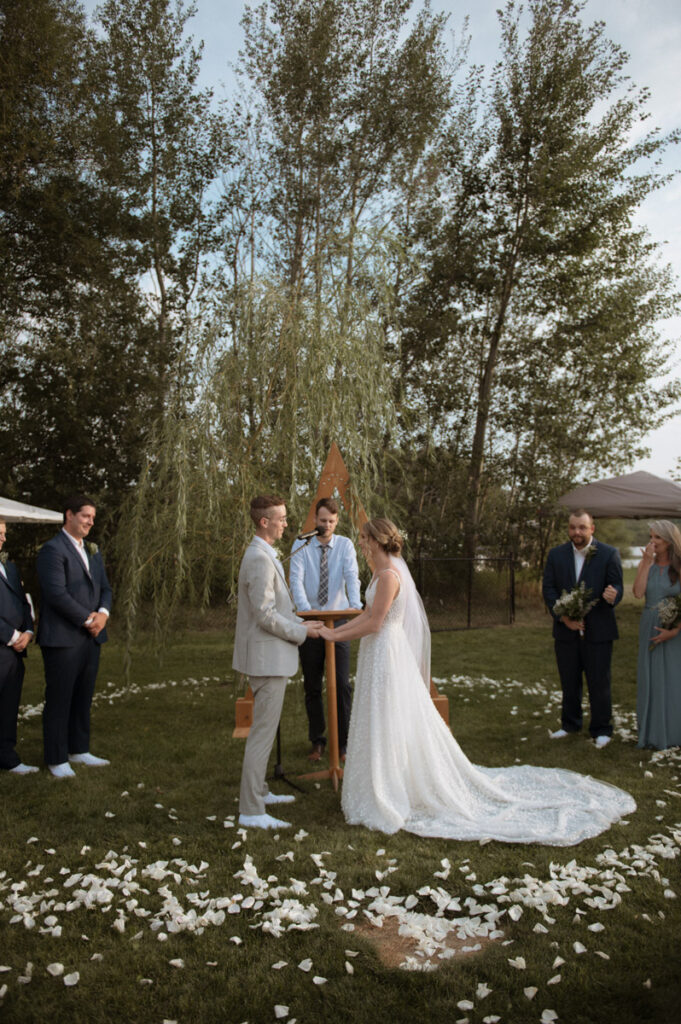 Sudbury backyard wedding bride and groom during ceremony. 