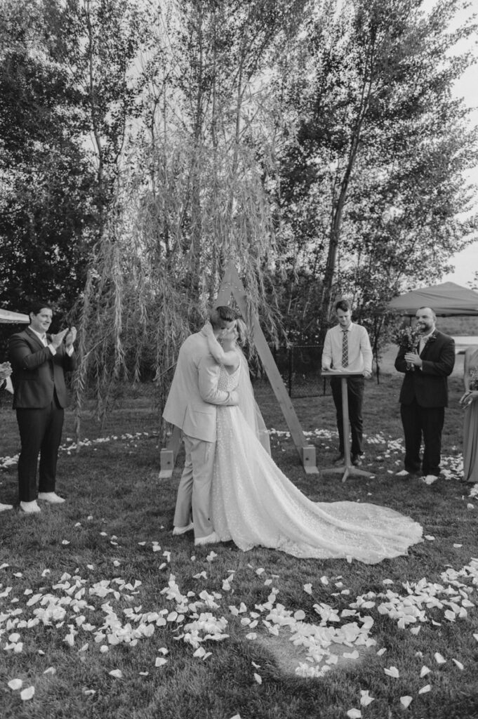 Sudbury backyard wedding first kiss. 