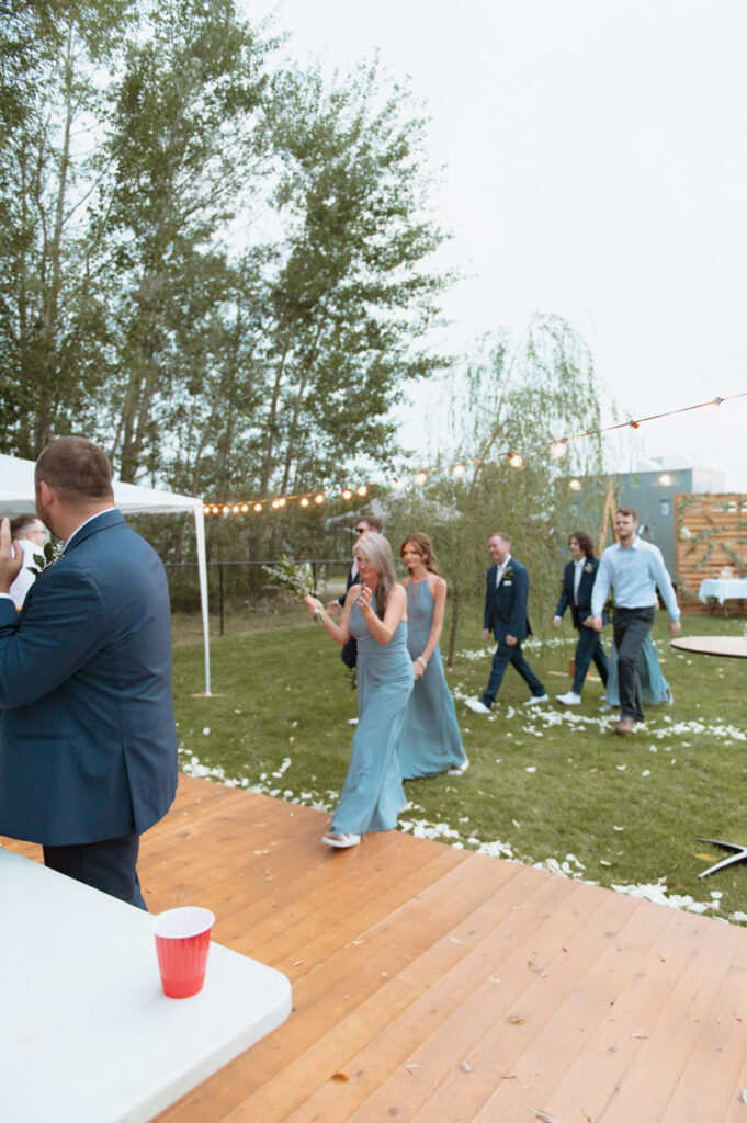 Sudbury backyard wedding party making their grand entrance. 