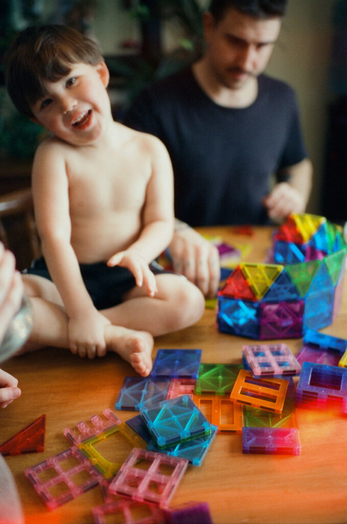 Documentary-style image  showing a candid family moment at home