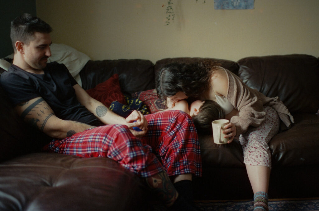 Documentary-style image by Sudbury family photographer showing a candid family moment at home