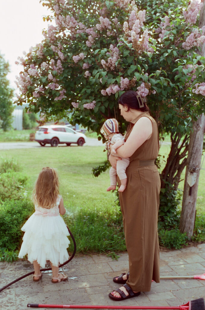 family outside in the sun, documented by a Sudbury Family Photographer