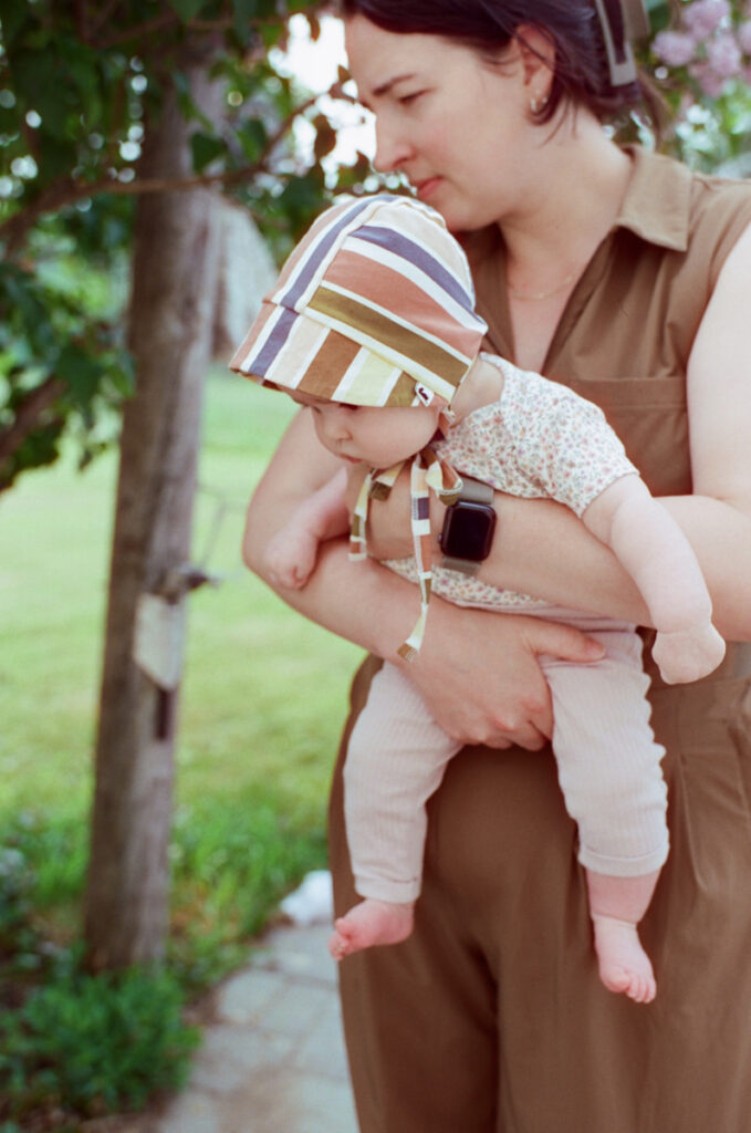 family outside in the sun, documented by a Sudbury Family Photographer