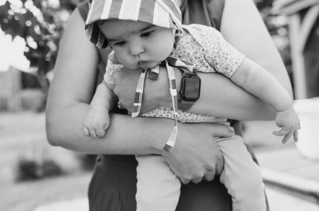 family outside in the sun, documented by a Sudbury Family Photographer