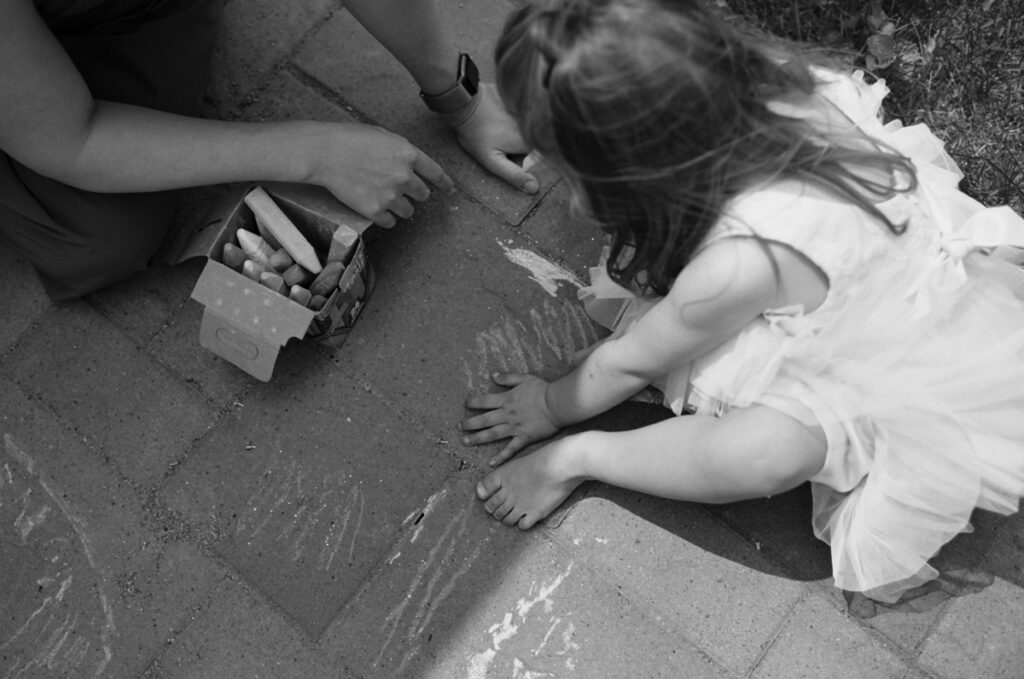 family outside in the sun, documented by a Sudbury Family Photographer