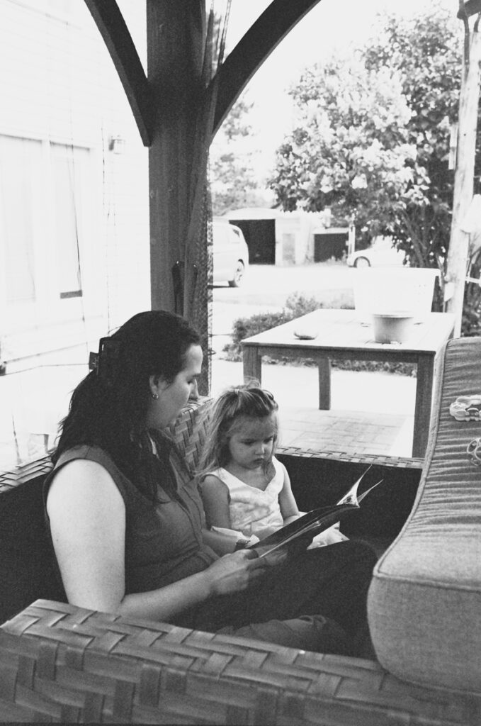 Family outside being documented by an Ontario Documentary Photographer. 