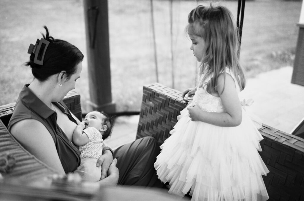 Family outside being documented by an Ontario Documentary Photographer. 