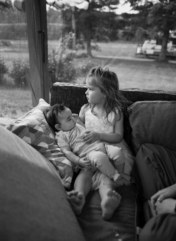 Family outside being documented by an Ontario Documentary Photographer. 