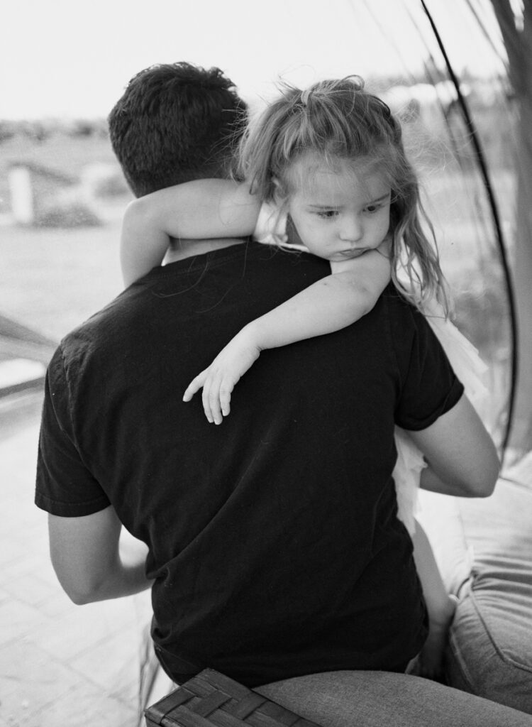 father and daughter outside in the sun, documented by a Sudbury Family Photographer