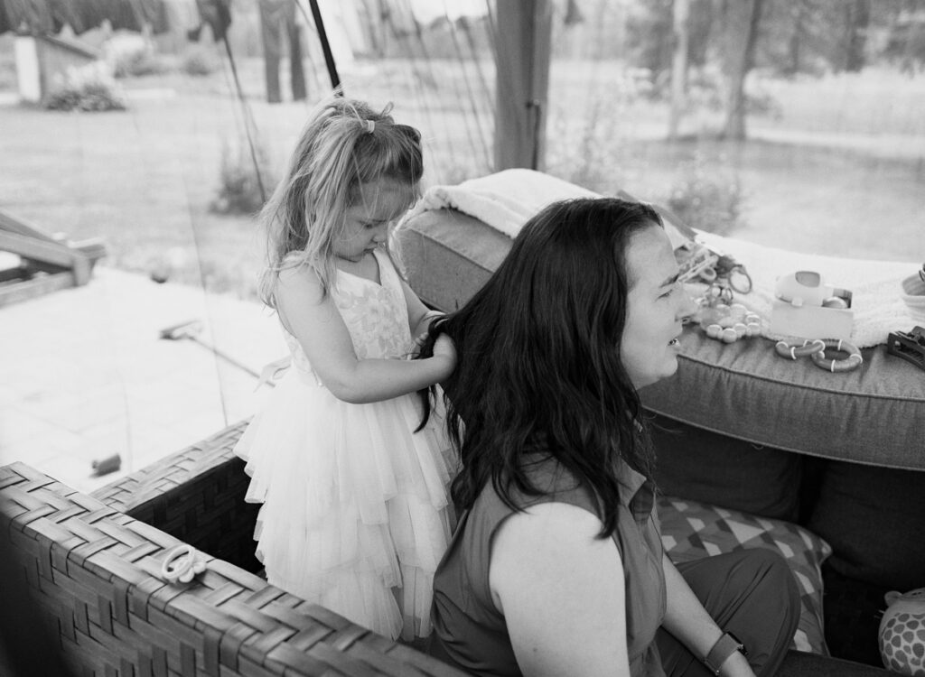 Family outside being documented by an Ontario Documentary Photographer. 