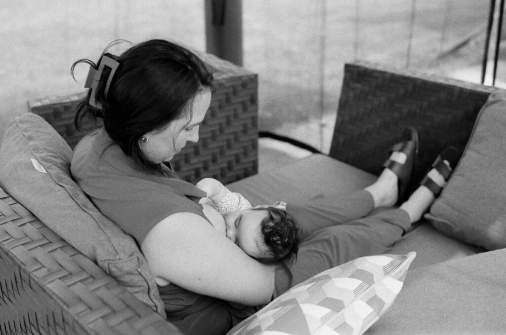 Family outside being documented by an Ontario Documentary Photographer. 