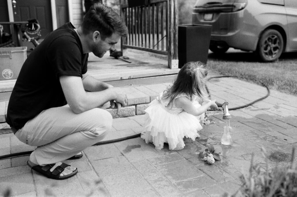 family outside in the sun, documented by a Sudbury Family Photographer