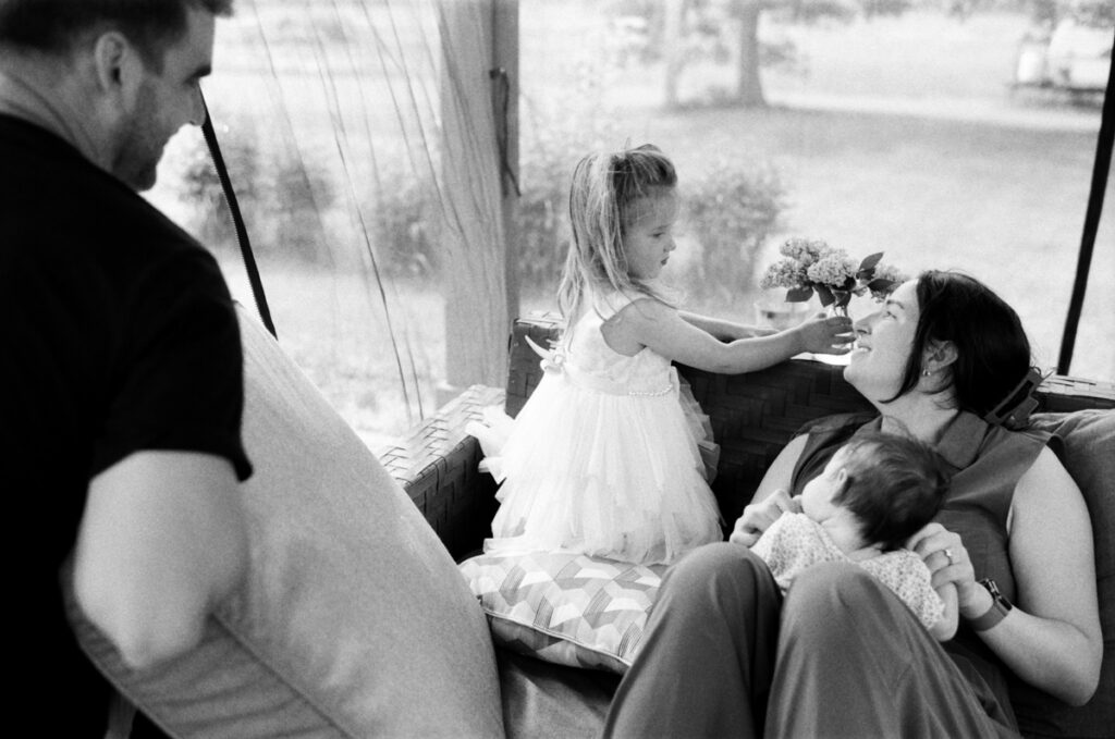 Family outside being documented by an Ontario Documentary Photographer. 