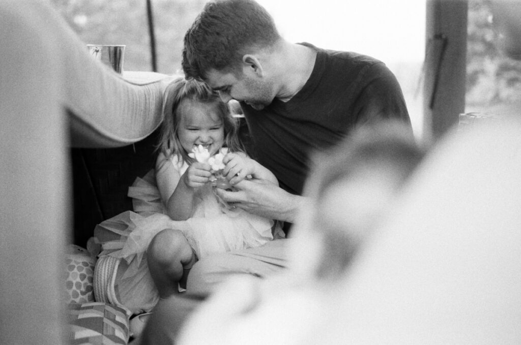 Family outside being documented by an Ontario Documentary Photographer. 