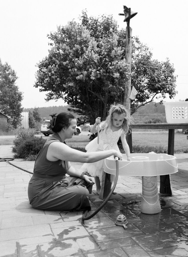 family outside in the sun, documented by a Sudbury Family Photographer